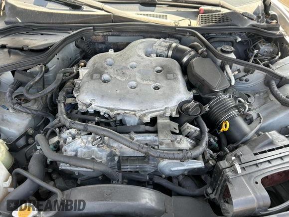 2003 Infiniti G35 w/Leather with VIN JNKCV51E73M000353, listed as a Copart auction lot 73202104 with 240,207 mi miles and Clean Title. Bid and sale history available at DreamBid. Image 7.