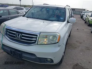 2013 Honda Pilot Touring with VIN 5FNYF3H95DB031130, listed as a IAAI auction lot 42669792 with 255,280 mi miles and . Bid and sale history available at DreamBid. Image 2.