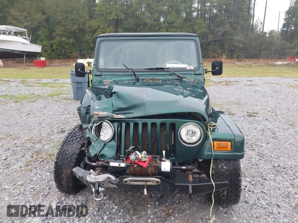 2000 Jeep Wrangler Sahara with VIN 1J4FA59SXYP701098, listed as a IAAI auction lot 41592872 with 1 mi miles. Bid and sale history available at carsss.com. Image 11.