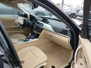 2016 BMW 3 Series 320i with VIN WBA8A9C51GK617012, listed as a IAAI auction lot 41896624 with 56,289 mi miles. Bid and sale history available at carsss.com. Image 5.