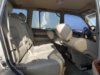 1999 Lexus LX 470 z VIN JT6HT00W1X0045075, wystawiony jako Copart lot #55684785 z przebiegiem 168 855 mil mil oraz Szkody całkowita. Historia ofert i sprzedaży dostępna na DreamBid. Obrazek 11.