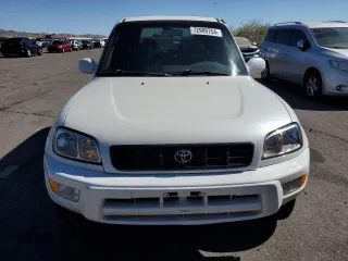 2000 Toyota RAV4 with VIN JT3HP10V0Y7164016, listed as a Copart auction lot 72999754 with 215,880 mi miles and Salvage Title. Bid and sale history available at carsss.com. Image 5.