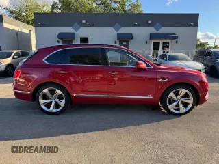 2017 Bentley Bentayga W12 z VIN SJAAC2ZV1HC014037, wystawiony jako Copart lot #54799655 z przebiegiem 36 099 mil mil oraz Szkody całkowita. Historia ofert i sprzedaży dostępna na DreamBid. Obrazek 13.