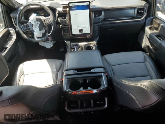 2022 Ford F-150 Lightning Pro z VIN 1FT6W1EV8NWG04113, wystawiony jako Copart lot #57489635 z przebiegiem 48 990 mil mil oraz Szkoda całkowita • Salvage title. Historia ofert i sprzedaży dostępna na DreamBid. Obrazek 8.