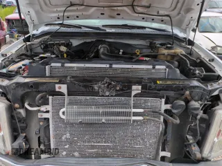 2010 Ford F-250 XL with VIN 1FTSW2B55AEA11379, listed as a Copart auction lot 62398055 with 155,397 mi miles and Salvage title. Bid and sale history available at DreamBid. Image 11.