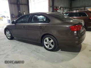 2014 Volkswagen Jetta TDI w/Premium/Nav with VIN 3VWLL7AJ3EM352687, listed as a Copart auction lot 63249725 with 122,678 mi miles and Clean title. Bid and sale history available at DreamBid. Image 2.