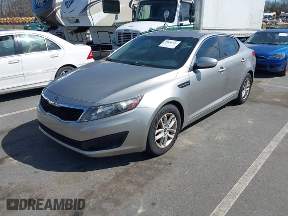 2011 Kia Optima LX with VIN KNAGM4A70B5081042, listed as a IAAI auction lot 41835721 with 203,609 mi miles and . Bid and sale history available at carsss.com. Image 2.