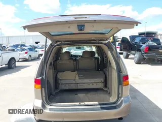2003 Honda Odyssey EX-L z VIN 5FNRL18993B116892, wystawiony jako IAAI lot #42241908 z przebiegiem 276 223 mil mil oraz . Historia ofert i sprzedaży dostępna na DreamBid. Obrazek 18.