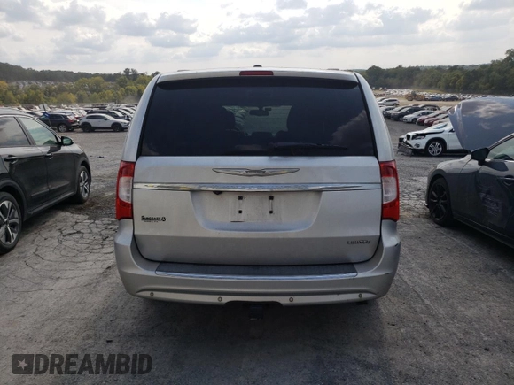2011 Chrysler Town & Country Limited with VIN 2A4RR6DGXBR698448, listed as a Copart auction lot 70932134 with 130,140 mi miles and Salvage Title. Bid and sale history available at DreamBid. Image 6.