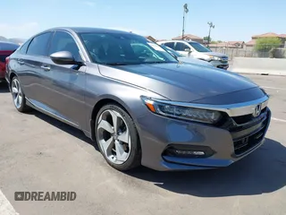 2019 Honda Accord Touring z VIN 1HGCV2F92KA004825, wystawiony jako IAAI lot #41974555 z przebiegiem 74 464 mil mil oraz . Historia ofert i sprzedaży dostępna na DreamBid. Obrazek 1.