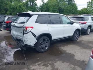 2021 Honda Passport EX-L with VIN 5FNYF8H54MB041738, listed as a IAAI auction lot 42310470 with 52,409 mi miles and . Bid and sale history available at DreamBid. Image 4.