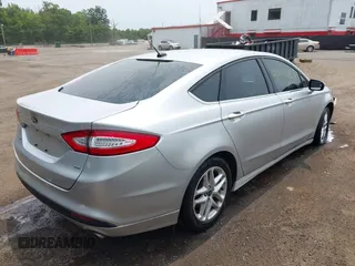 2016 Ford Fusion SE with VIN 3FA6P0H76GR338557, listed as a IAAI auction lot 42424262 with 165,299 mi miles and . Bid and sale history available at DreamBid. Image 4.