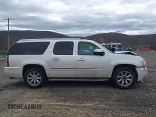 2011 GMC Yukon XL Denali z VIN 1GKS2MEF7BR271728, wystawiony jako IAAI lot #42050555 z przebiegiem 251 752 mil mil oraz . Historia ofert i sprzedaży dostępna na DreamBid. Obrazek 13.