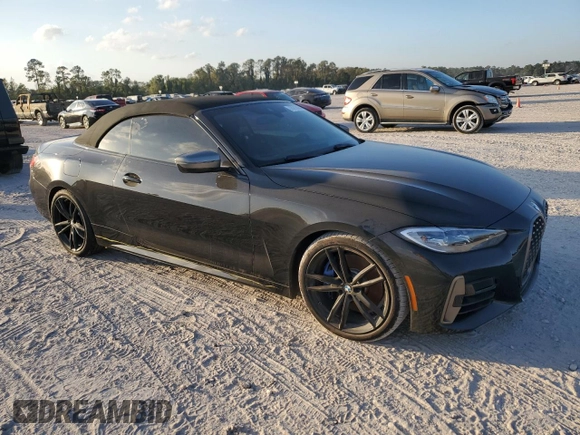 2024 BMW 4 Series M440i with VIN WBA53AT05RCP27562, listed as a Copart auction lot 77213334 with Not Provided miles and Salvage Title. Bid and sale history available at carsss.com. Image 4.