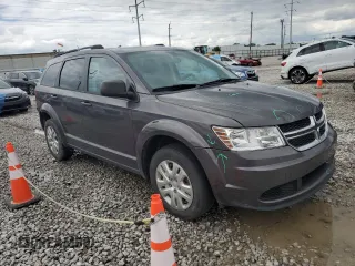 2017 Dodge Journey SE z VIN 3C4PDCAB1HT709104, wystawiony jako Copart lot #57132935 z przebiegiem 89 024 mil mil oraz Szkoda całkowita • Salvage title. Historia ofert i sprzedaży dostępna na DreamBid. Obrazek 4.