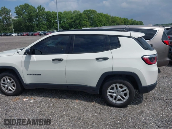 2018 Jeep Compass Sport with VIN 3C4NJCAB0JT124679, listed as a IAAI auction lot 42720262 with 119,267 mi miles and . Bid and sale history available at DreamBid. Image 14.