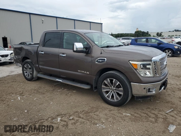 2017 Nissan Titan SV z VIN 1N6AA1E64HN517933, wystawiony jako Copart lot #72793864 z przebiegiem 60 572 mil mil oraz Szkoda całkowita • Salvage title. Historia ofert i sprzedaży dostępna na DreamBid. Obrazek 4.