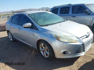 2013 Ford Focus SE z VIN 1FADP3F22DL290534, wystawiony jako IAAI lot #42323118 z przebiegiem 161 201 mil mil oraz . Historia ofert i sprzedaży dostępna na DreamBid. Obrazek 1.