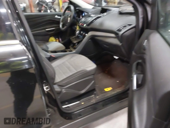 2015 Ford Escape SE with VIN 1FMCU9G97FUA21287, listed as a IAAI auction lot 41990144 with 55,036 mi miles and . Bid and sale history available at DreamBid. Image 5.
