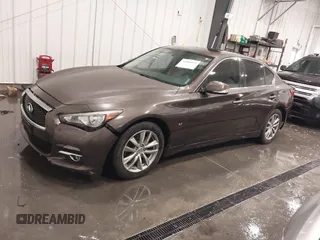 2015 Infiniti Q50 Premium z VIN JN1BV7ARXFM418280, wystawiony jako IAAI lot #42080879 z przebiegiem 126 411 mil mil oraz . Historia ofert i sprzedaży dostępna na DreamBid. Obrazek 2.
