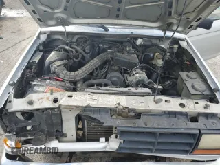 1991 Ford Ranger Splash with VIN 1FTCR10A6MUB73909, listed as a Copart auction lot 76077984 with 45,403 mi miles and Salvage Title. Bid and sale history available at DreamBid. Image 11.