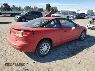 1999 Saturn SC with VIN 1G8ZY127XXZ314531, listed as a Copart auction lot 49653805 with 130,457 mi miles and Salvage Title. Bid and sale history available at carsss.com. Image 3.