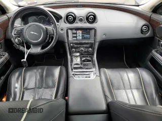 2014 Jaguar XJ Portfolio with VIN SAJWJ2GD4E8V69651, listed as a Copart auction lot 52426195 with 56,413 mi miles and Salvage title. Bid and sale history available at DreamBid. Image 8.