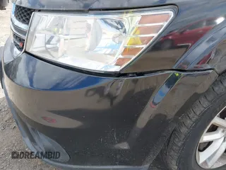 2013 Dodge Journey SXT with VIN 3C4PDDBG7DT553130, listed as a IAAI auction lot 40570369 with Not Provided miles and . Bid and sale history available at DreamBid. Image 15.