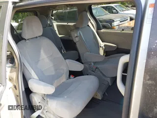 2015 Toyota Sienna LE AAS with VIN 5TDKK3DCXFS552524, listed as a IAAI auction lot 42060065 with 249,332 mi miles and . Bid and sale history available at DreamBid. Image 7.