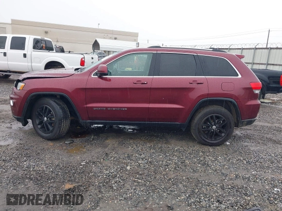 2018 Jeep Grand Cherokee Laredo E with VIN 1C4RJEAG6JC304608, listed as a IAAI auction lot 41421010 with 178,708 mi miles and . Bid and sale history available at DreamBid. Image 14.