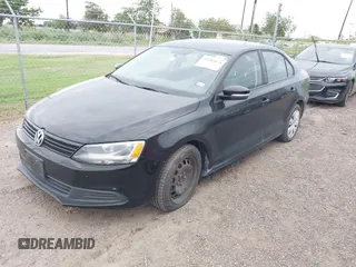 2014 Volkswagen Jetta SE with VIN 3VWD07AJ6EM294233, listed as a IAAI auction lot 42503674 with 80,981 mi miles and . Bid and sale history available at DreamBid. Image 2.