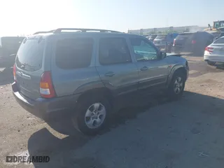 2004 Mazda Tribute ES with VIN 4F2CZ06184KM32333, listed as a IAAI auction lot 42041183 with 33,646 mi miles. Bid and sale history available at carsss.com. Image 4.