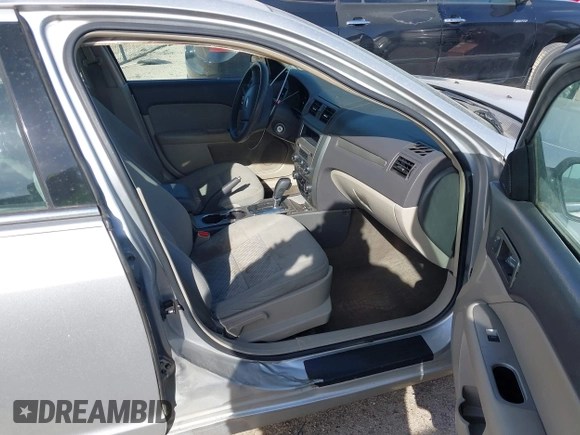 2012 Ford Fusion S with VIN 3FAHP0GA2CR143572, listed as a IAAI auction lot 41826526 with 199,083 mi miles. Bid and sale history available at carsss.com. Image 5.