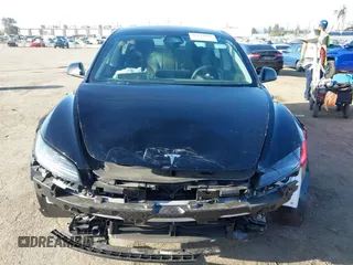 2025 Tesla Model 3 Long Range with VIN 5YJ3E1EB3SF926394, listed as a IAAI auction lot 42249844 with 1,090 mi miles and . Bid and sale history available at DreamBid. Image 13.