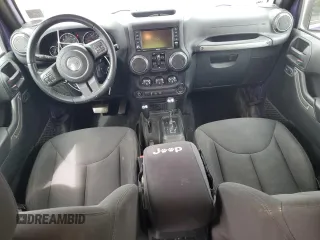 2018 Jeep Wrangler Unlimited Sport with VIN 1C4BJWDG9JL910410, listed as a Copart auction lot 56561955 with 57,450 mi miles and Salvage title. Bid and sale history available at DreamBid. Image 8.