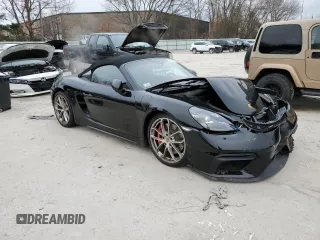 2023 Porsche 718 Spyder z VIN WP0CC2A81PS222016, wystawiony jako Copart lot #84939084 z przebiegiem 20 612 mil mil oraz Szkody całkowita. Historia ofert i sprzedaży dostępna na DreamBid. Obrazek 4.