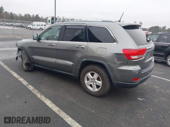 2011 Jeep Grand Cherokee 70th Anniversary with VIN 1J4RR4GG0BC608829, listed as a IAAI auction lot 41960876 with 231,714 mi miles. Bid and sale history available at carsss.com. Image 3.