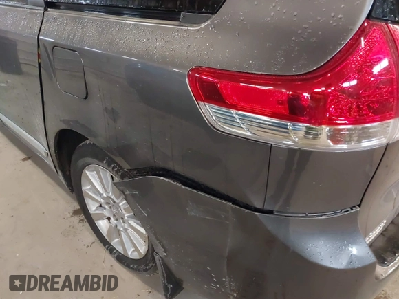 2014 Toyota Sienna LE with VIN 5TDJK3DC9ES071870, listed as a IAAI auction lot 41133491 with 82,134 mi miles. Bid and sale history available at carsss.com. Image 6.