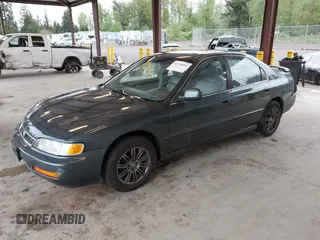 1997 Honda Accord EX with VIN 1HGCD5669VA090505, listed as a IAAI auction lot 42138093 with 207,191 mi miles and . Bid and sale history available at carsss.com. Image 2.