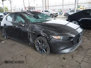 2020 Mazda 3 with VIN JM1BPALM0L1163707, listed as a IAAI auction lot 42194922 with 30,363 mi miles and . Bid and sale history available at DreamBid. Image 1.