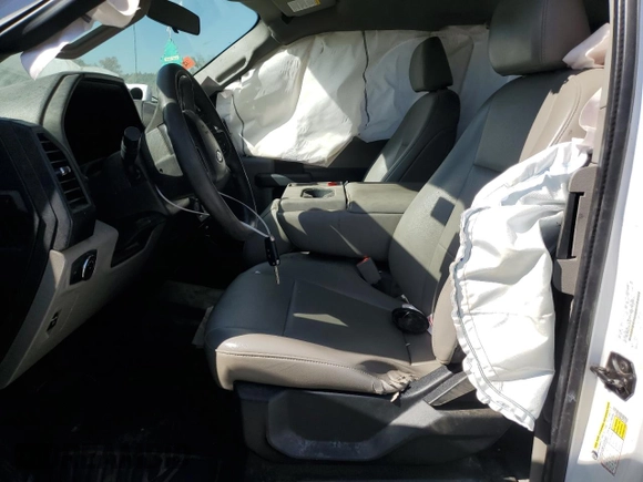 2020 Ford F-150 XL with VIN 1FTEX1EB9LKF24189, listed as a Copart auction lot 77400254 with 80,618 mi miles and Salvage Title. Bid and sale history available at carsss.com. Image 7.