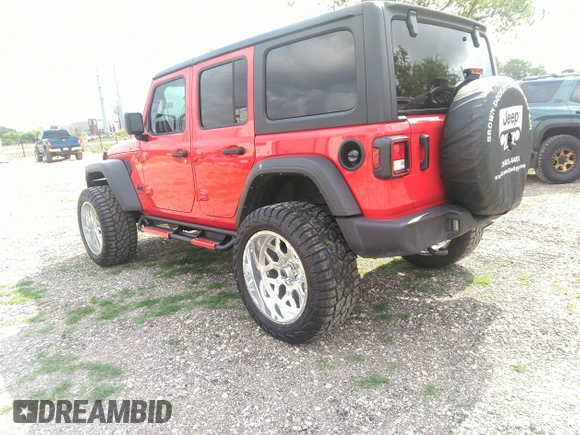 2024 Jeep Wrangler Sport S with VIN 1C4PJXDNXRW110431, listed as a IAAI auction lot 42156570 with 9,699 mi miles. Bid and sale history available at carsss.com. Image 3.