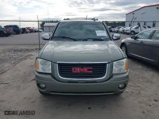 2004 GMC Envoy SLE with VIN 1GKDS13S442240682, listed as a IAAI auction lot 41764185 with 139,348 mi miles. Bid and sale history available at carsss.com. Image 13.