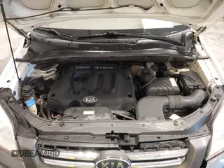 2007 Kia Sportage LX with VIN KNDJF724877399530, listed as a IAAI auction lot 41696698 with 124,967 mi miles. Bid and sale history available at carsss.com. Image 10.