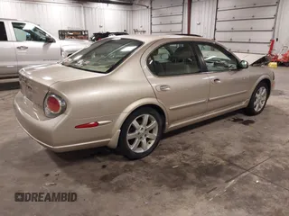 2002 Nissan Maxima GLE z VIN JN1DA31AX2T305310, wystawiony jako IAAI lot #42302521 z przebiegiem 68 920 mil mil oraz . Historia ofert i sprzedaży dostępna na DreamBid. Obrazek 4.
