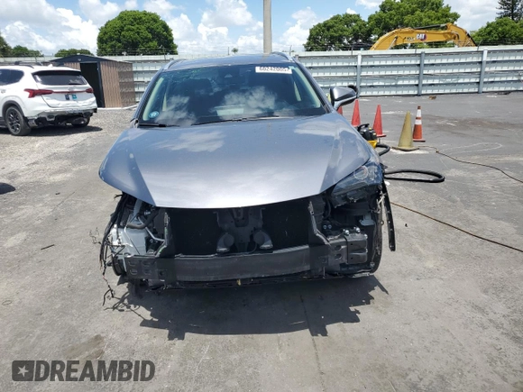 2021 Lexus NX 300 with VIN JTJDARBZXM2187754, listed as a Copart auction lot 60242005 with 61,455 mi miles and Salvage title. Bid and sale history available at DreamBid. Image 5.