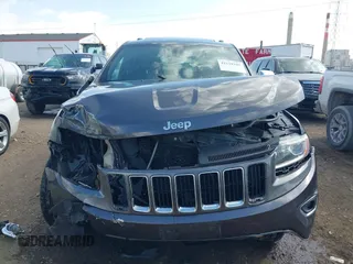 2014 Jeep Grand Cherokee Limited with VIN 1C4RJFBT4EC349957, listed as a IAAI auction lot 42118241 with 127,168 mi miles and . Bid and sale history available at DreamBid. Image 13.
