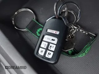 2015 Honda Odyssey Touring Elite with VIN 5FNRL5H92FB089627, listed as a IAAI auction lot 41115013 with Not Provided miles and . Bid and sale history available at DreamBid. Image 11.