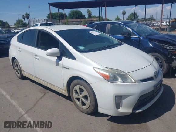 2012 Toyota Prius One z VIN JTDKN3DU6C5446511, wystawiony jako IAAI lot #42361355 z przebiegiem 166 991 mil mil oraz . Historia ofert i sprzedaży dostępna na DreamBid. Obrazek 1.