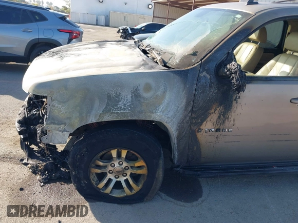 2007 Chevrolet Tahoe LS with VIN 1GNFC13J57R183484, listed as a IAAI auction lot 40837034 with Not provided miles and . Bid and sale history available at DreamBid. Image 15.